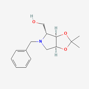 ((3Ar,4R,6aS)-5-Benzyl-2,2-dimethyltetrahydro-3aH-[1,3]dioxolo[4,5-c]pyrrol-4-yl)methanol